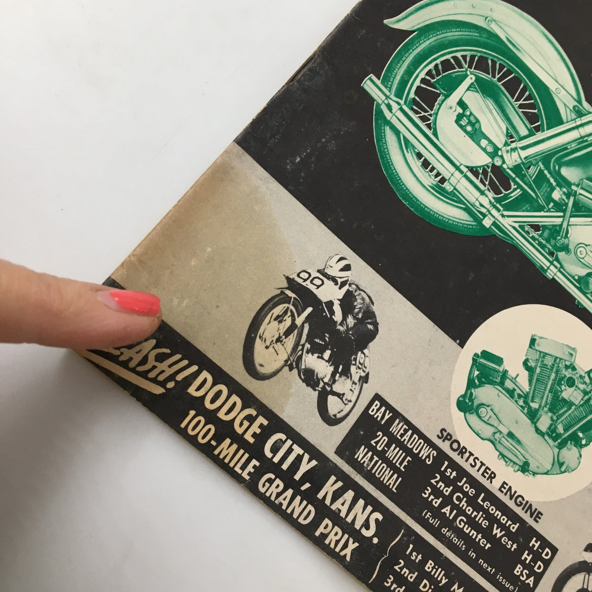 Close-up of the side panel of VTG Cycle Magazine October 1956 highlighting the text about the Dodge City Grand Prix and a racing motorcycle.
