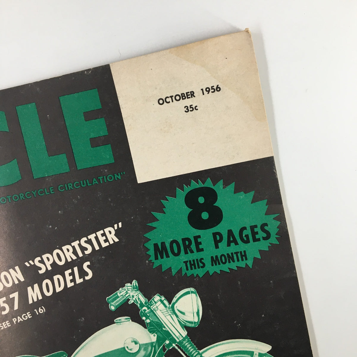 Top corner of VTG Cycle Magazine October 1956 displaying publication date and a promotional note about additional pages.