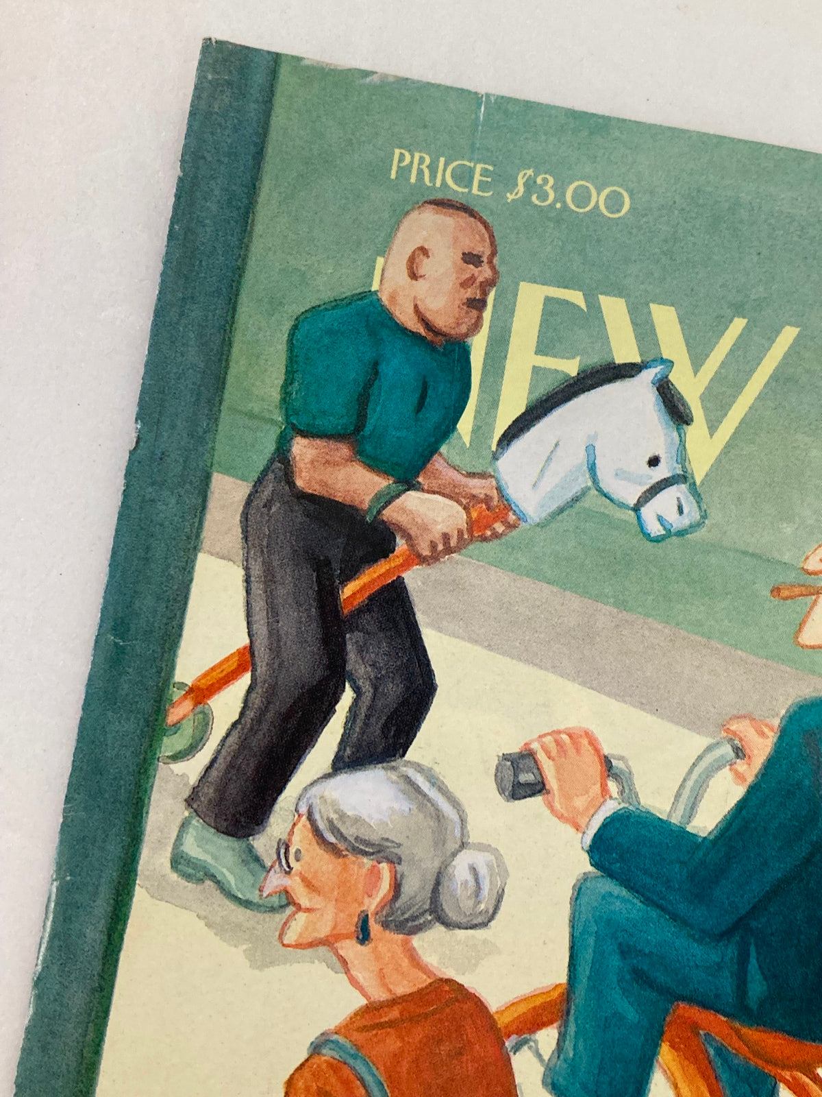 Close-up view of The New Yorker Cover July 24 2000 titled 'Reinventing The Wheel' by Art Spiegelman, highlighting a character holding a toy horse on a stick, emphasizing whimsical elements of urban culture.