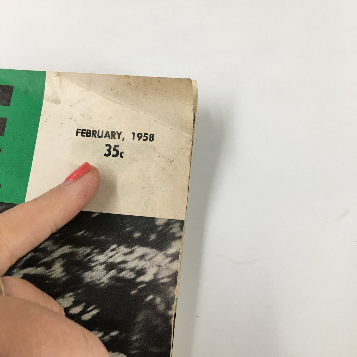 Close-up of the cover of VTG Cycle Magazine February 1958, highlighting the date and price of 35 cents.
