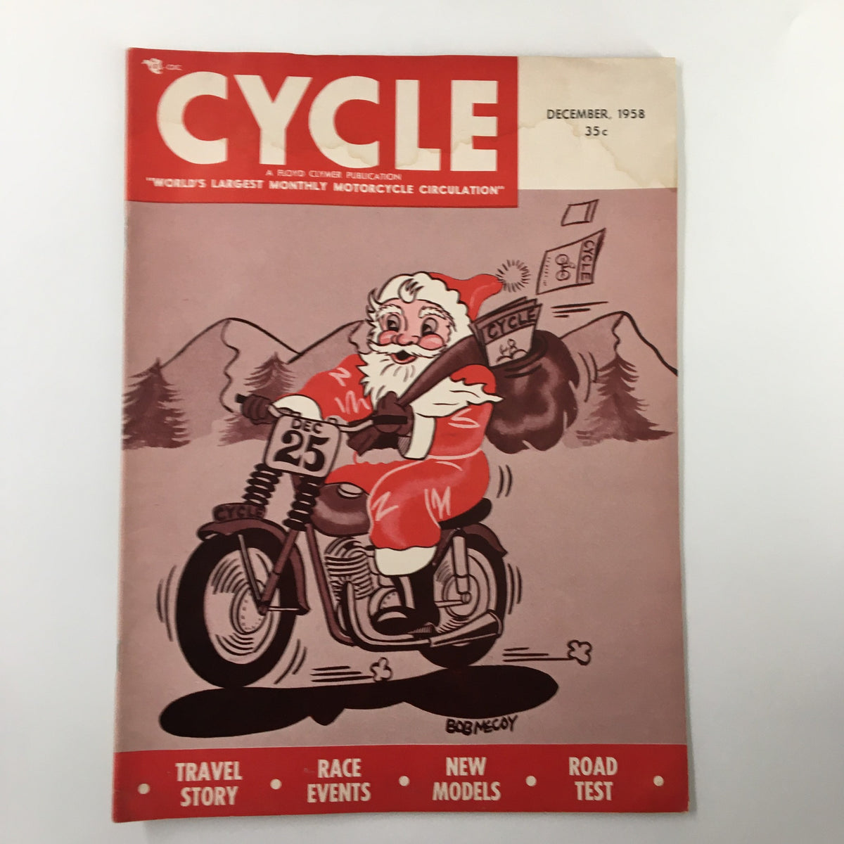 Cover of VTG Cycle Magazine December 1958 featuring a Santa Claus illustration riding a motorcycle, representing the festive theme and vintage motorcycle culture.