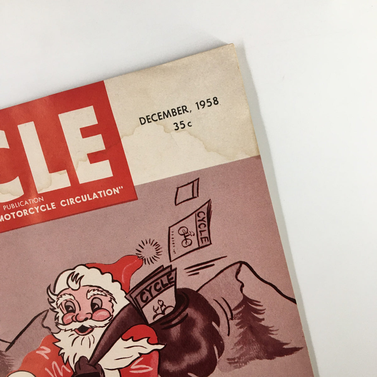 Close-up of the VTG Cycle Magazine December 1958 cover showing the publication date and price, emphasizing its vintage nature and historical significance.