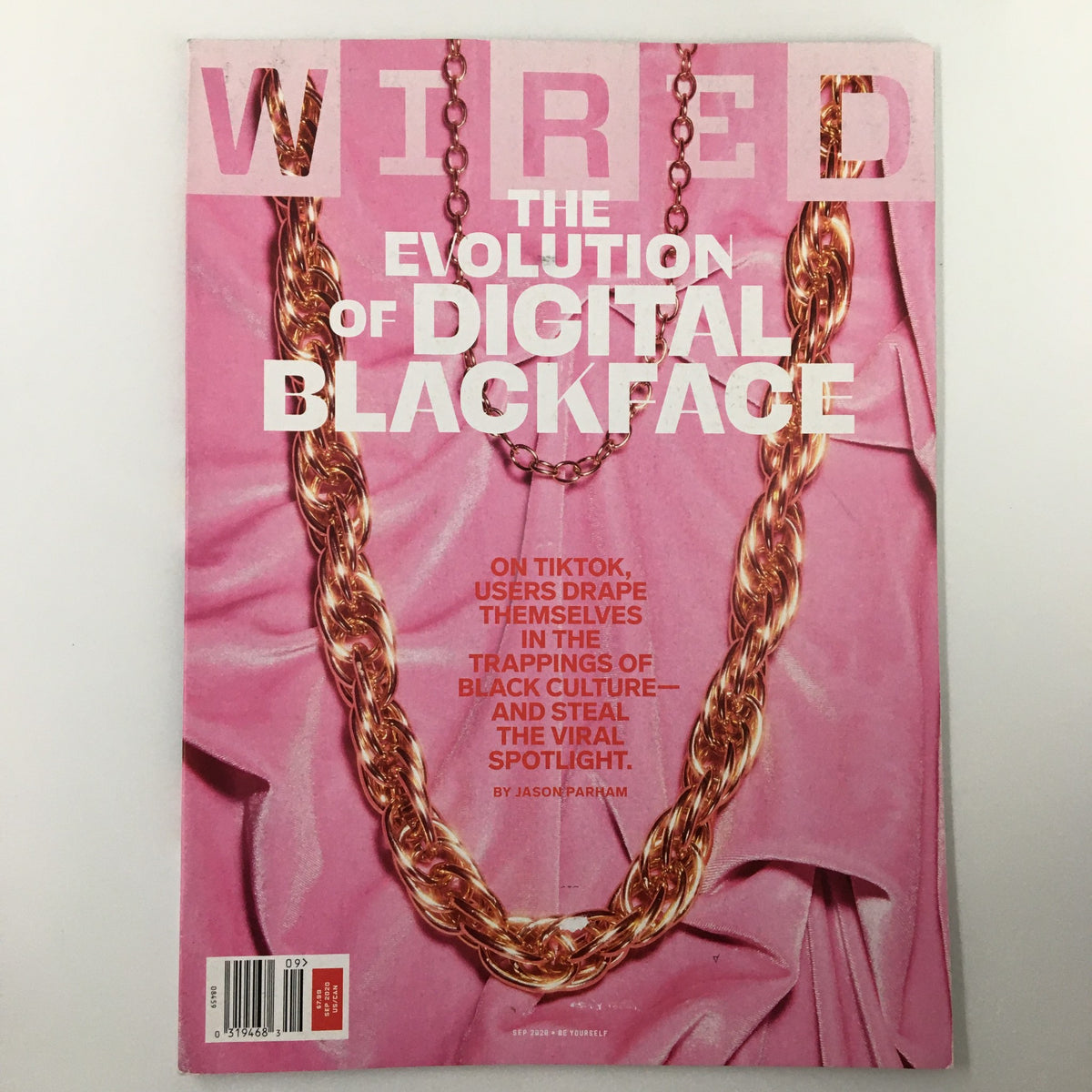 Cover of Wired Magazine September 2020 featuring the title 'The Evolution of Digital Blackface' with striking visuals of a gold chain on a pink background, a discussion on cultural representation.