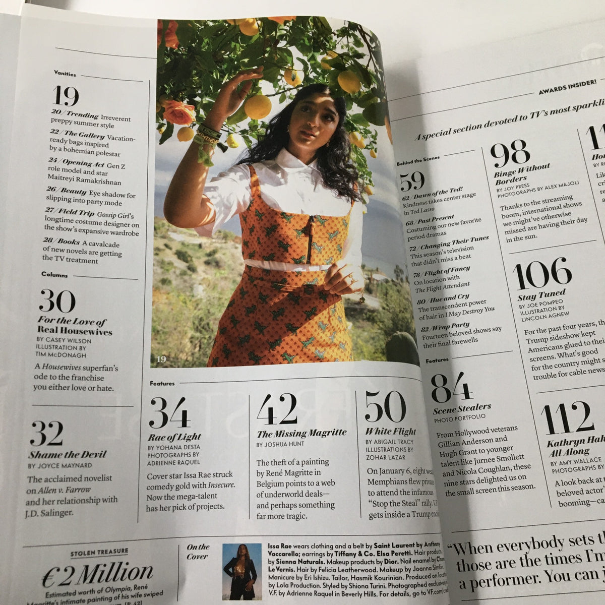 Inside page of Vanity Fair Magazine June 2021 featuring a portrait of actress Issa Rae among citrus trees, showcasing her vibrant style and personality.