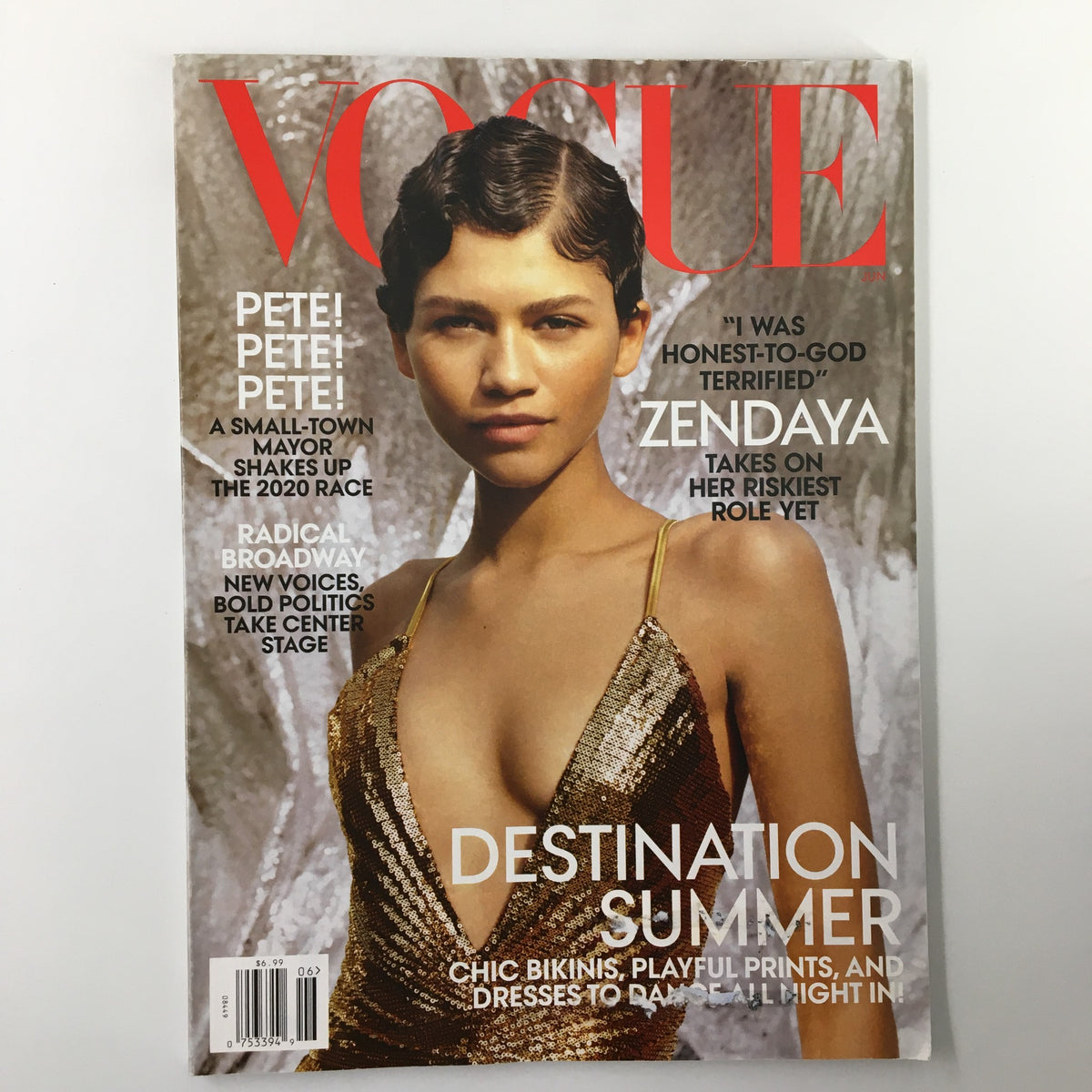Vogue Magazine June 2019 cover featuring Zendaya, showcasing her in a stunning gold sequined outfit with bold text highlighting her feature on the magazine.