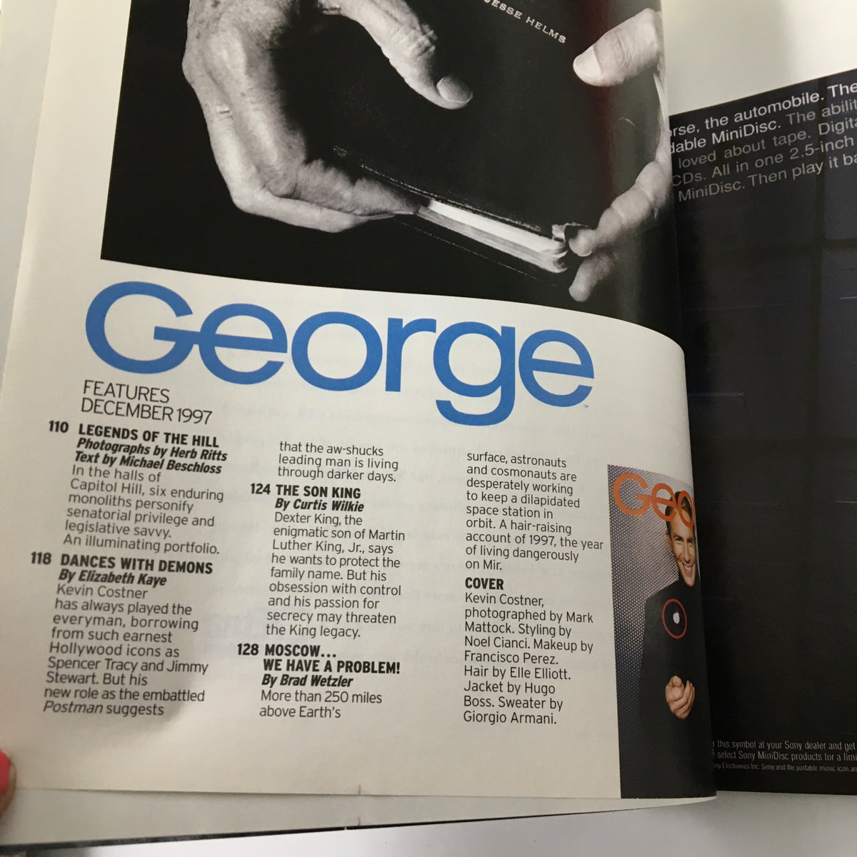 Inside page of George Magazine December 1997 highlighting the contents including features on Kevin Costner and important cultural topics of the late 90s.