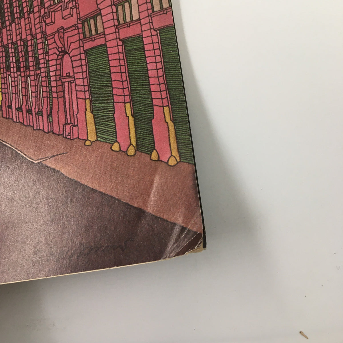 Detail shot of the cover of The New Yorker Magazine June 20, 1983, highlighting the lower corner, with a focus on the colorful architecture and artistic elements of the illustration 'Loading Dock' by Roxie Munro.
