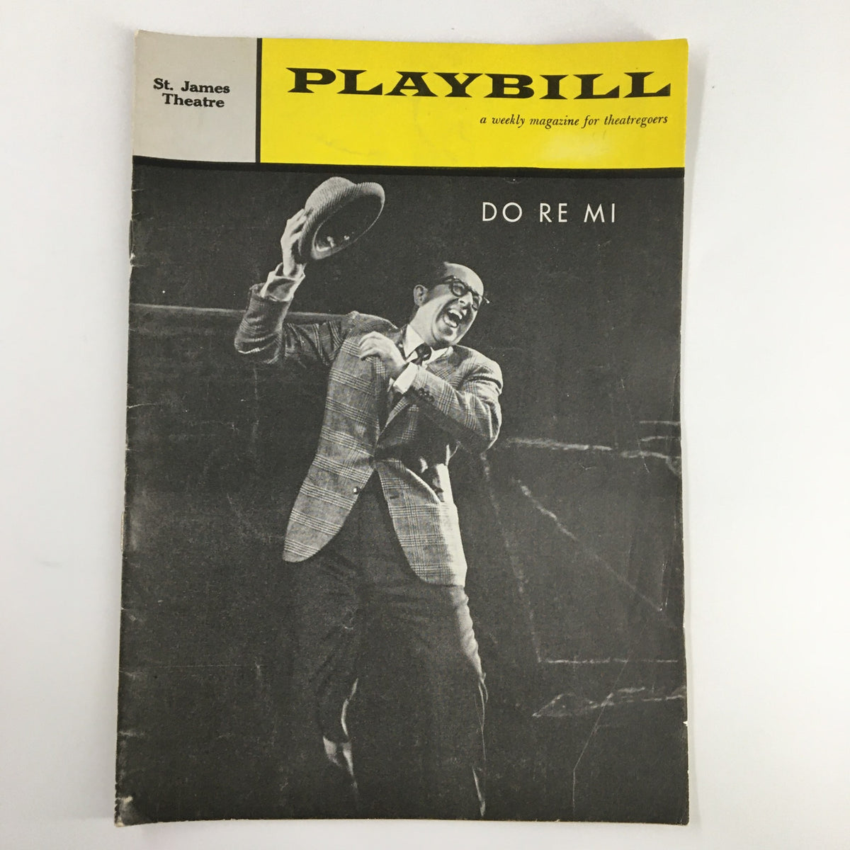 1961 Playbill for Do Re Mi at St. James Theatre showcasing a vibrant cover featuring Phil Silvers in a performance pose.