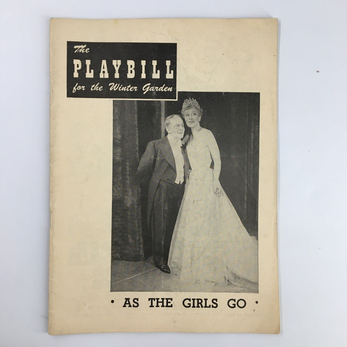 1949 Playbill for the Winter Garden featuring Bobby Clark in As The Girls Go, showcasing a vintage photograph of the cast on the cover.