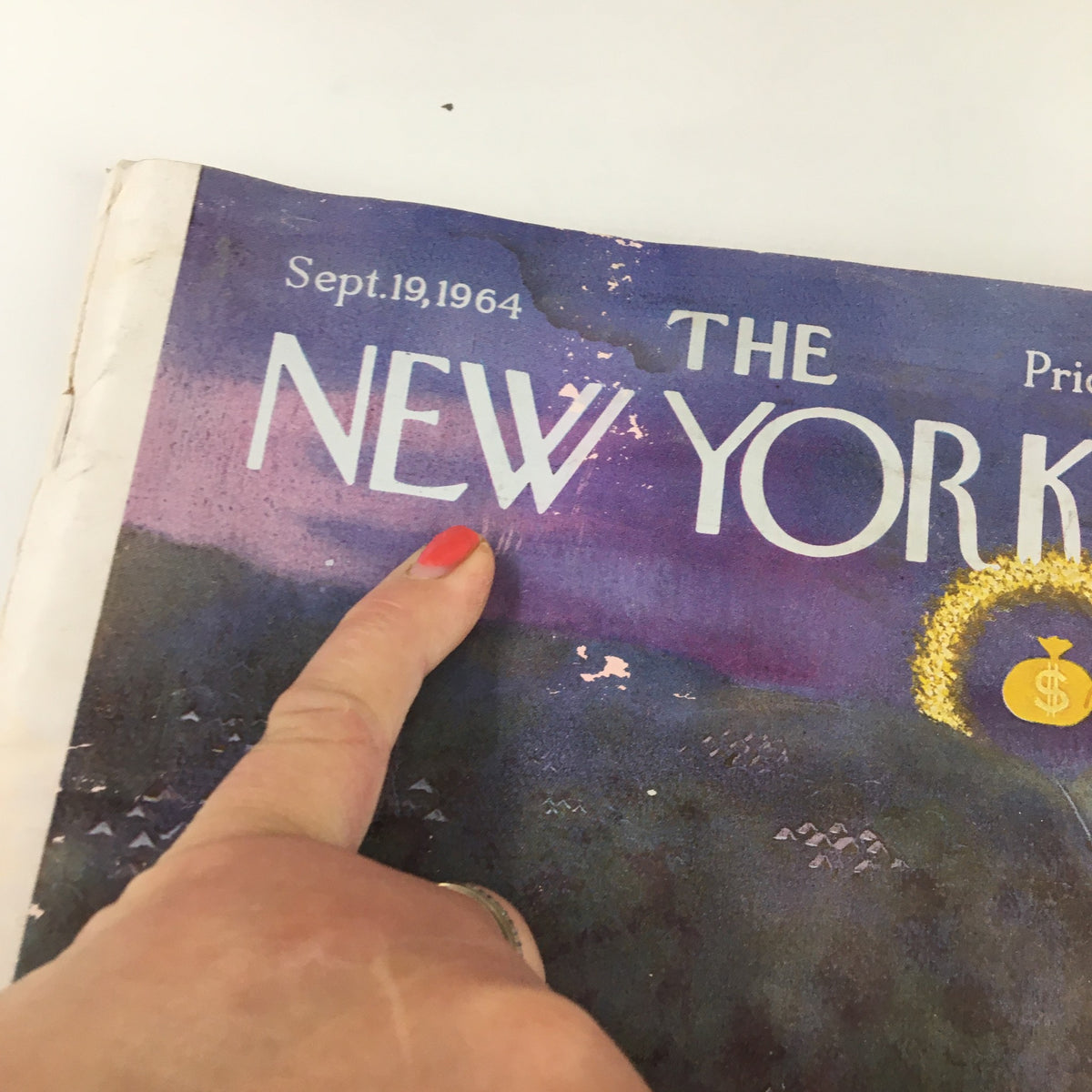 Detail shot highlighting the title 'The New Yorker' and the publication date, September 19, 1964, with visible damage to the cover.