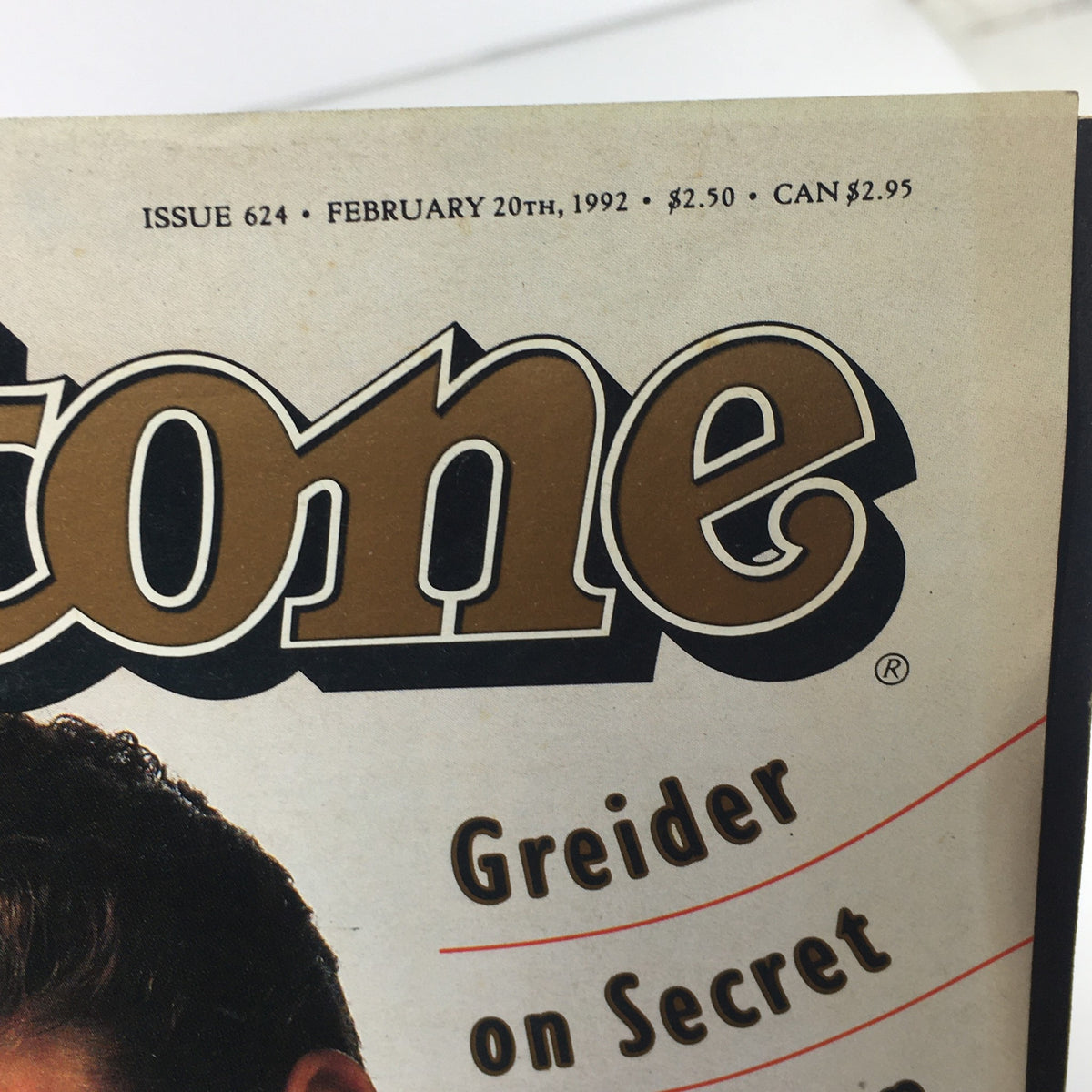 Cover of VTG Rolling Stone magazine from February 20, 1992 featuring the title prominently displayed, showcasing a vintage design and details about the issue's content.