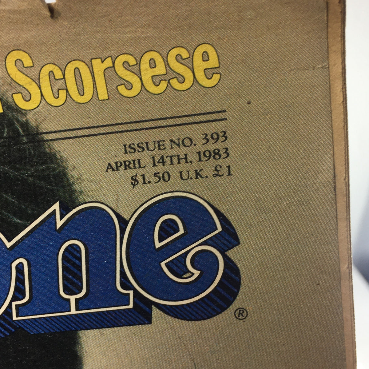 Close-up of Rolling Stone magazine issue dated April 14, 1983, featuring issue number 393, price details of $1.50 in the USA and £1 in the UK, showcasing the iconic logo of Rolling Stone as part of the vintage collectible.