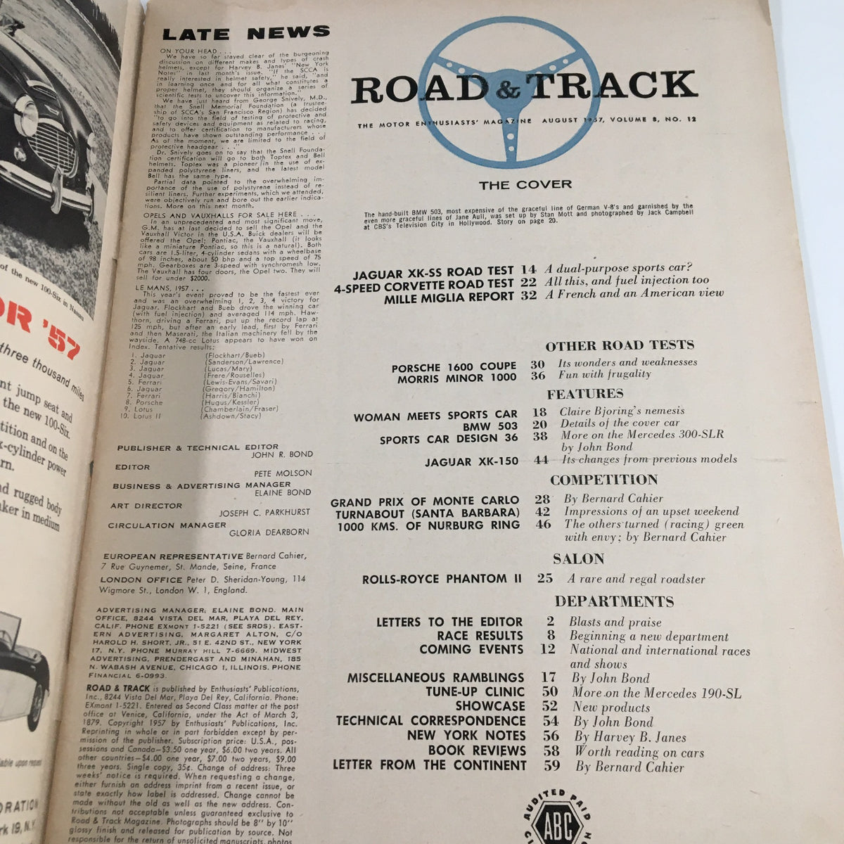 Inside page of VTG Road & Track Magazine August 1957, showcasing articles and previews, including a road test of the Jaguar XK-SSS and various automotive features.