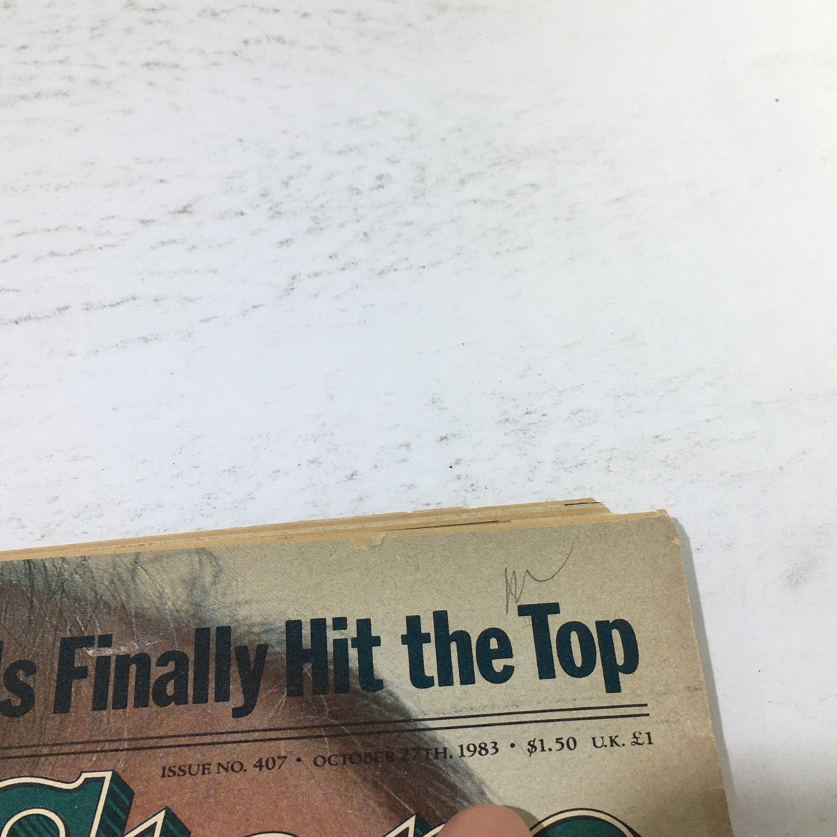 Top section of the October 27, 1983 Rolling Stone magazine cover featuring the tagline 'Finally Hit the Top' above Sean Connery as The Real Bond 007.