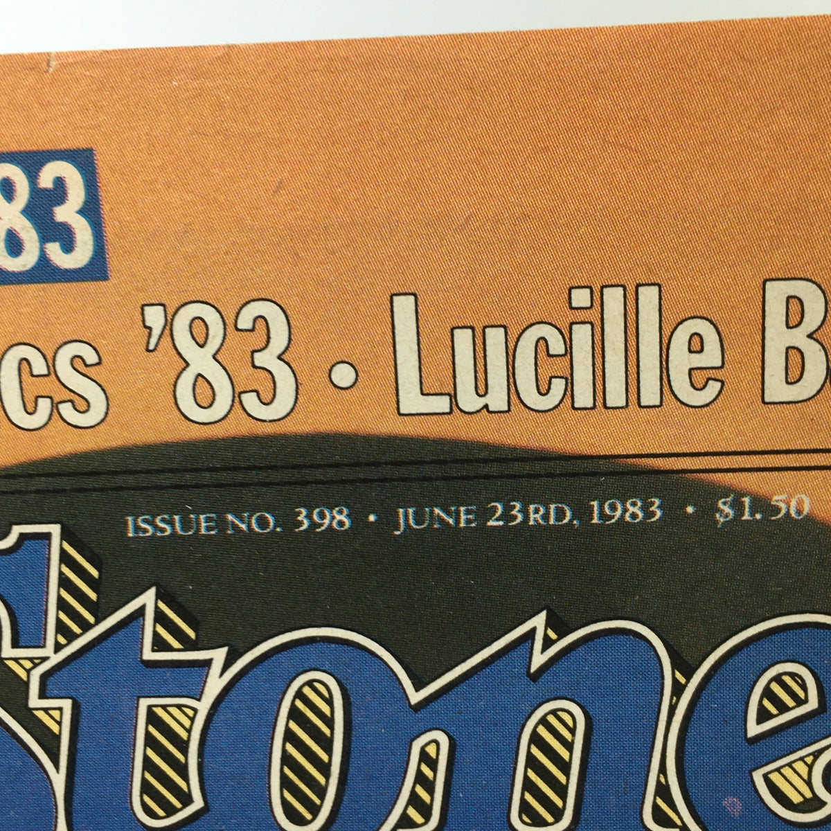 Detailed view of the VTG Rolling Stone magazine cover from June 23, 1983, showcasing the title and issue number along with Lucille Ball's name.