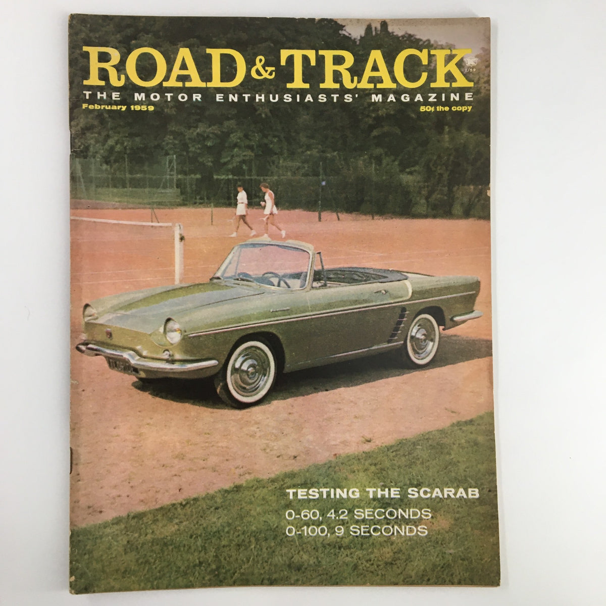 Cover of VTG Road & Track Magazine February 1959 featuring a vintage green car and the title 'ROAD & TRACK THE MOTOR ENTHUSIASTS' MAGAZINE' with the subtitle 'TESTING THE SCARAB' showcasing automotive history.