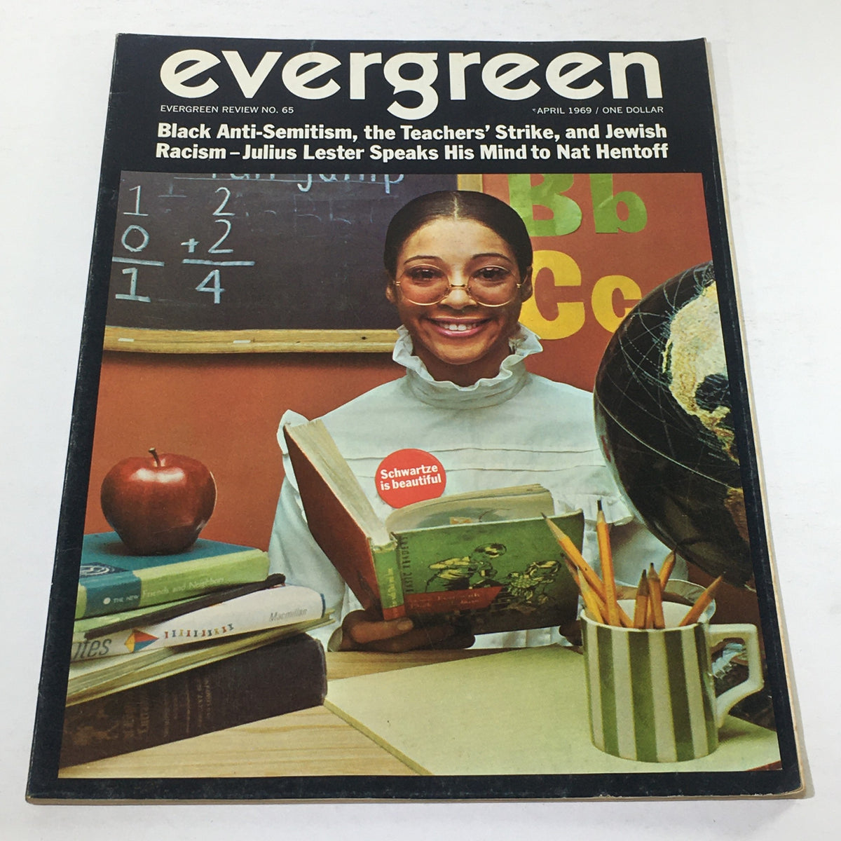 Cover of VTG Evergreen Magazine: April 1969 featuring a smiling woman with glasses holding a book, surrounded by an apple, books, and a globe, highlighting articles on Black Anti-Semitism and education.