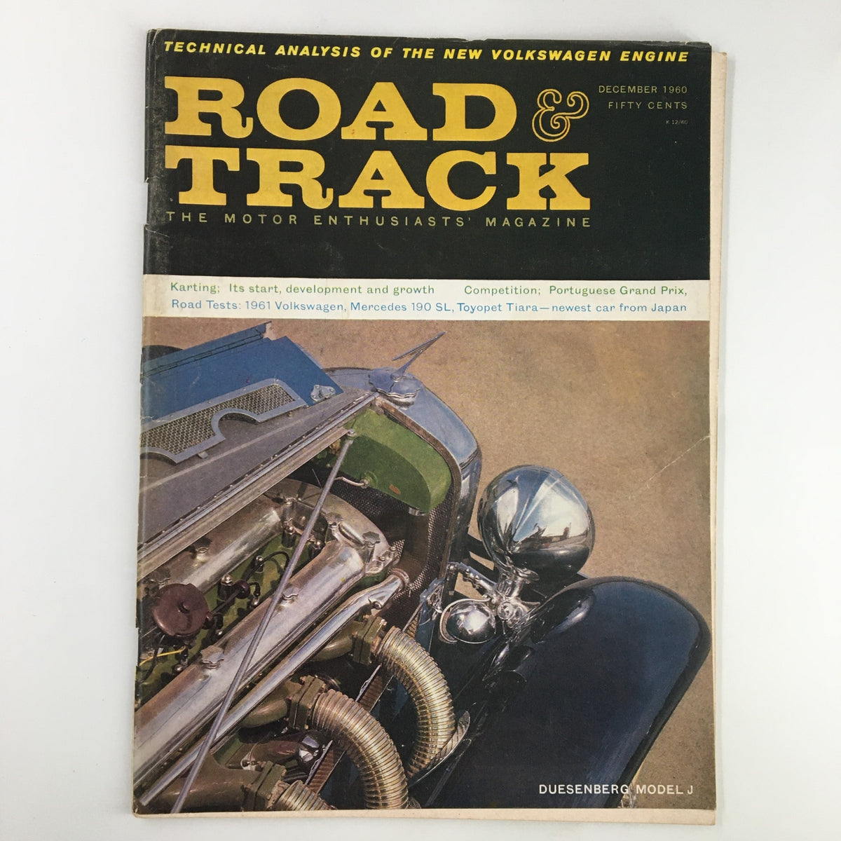 VTG Road & Track Magazine December 1960 featuring the Duesenberg Model J on the cover, showcasing an engine close-up with stylish detailing.