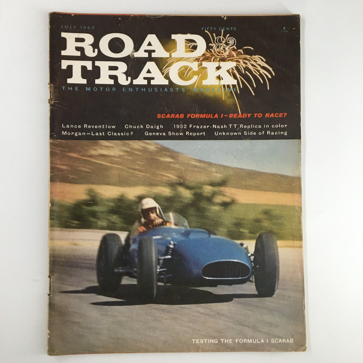 Cover of VTG Road & Track Magazine July 1960, featuring the Formula I Scarab, showcasing a historic racing scene.