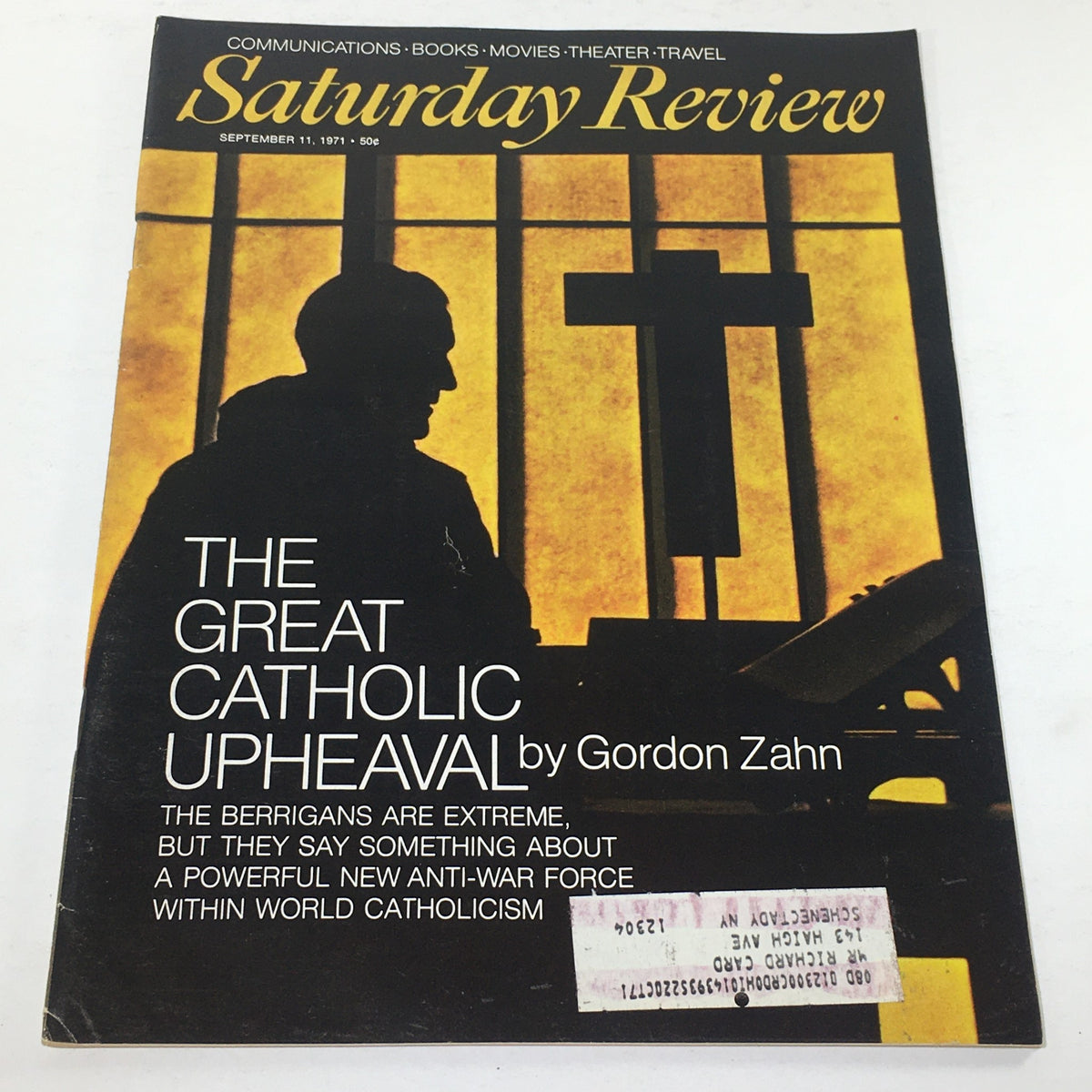 VTG Saturday Review magazine cover from September 11, 1971 featuring the title 'The Great Catholic Upeaval' by Gordon Zahn, highlighting themes of anti-war sentiment within world Catholicism. The cover displays a silhouette of a figure in front of a cross and features a vintage address label.