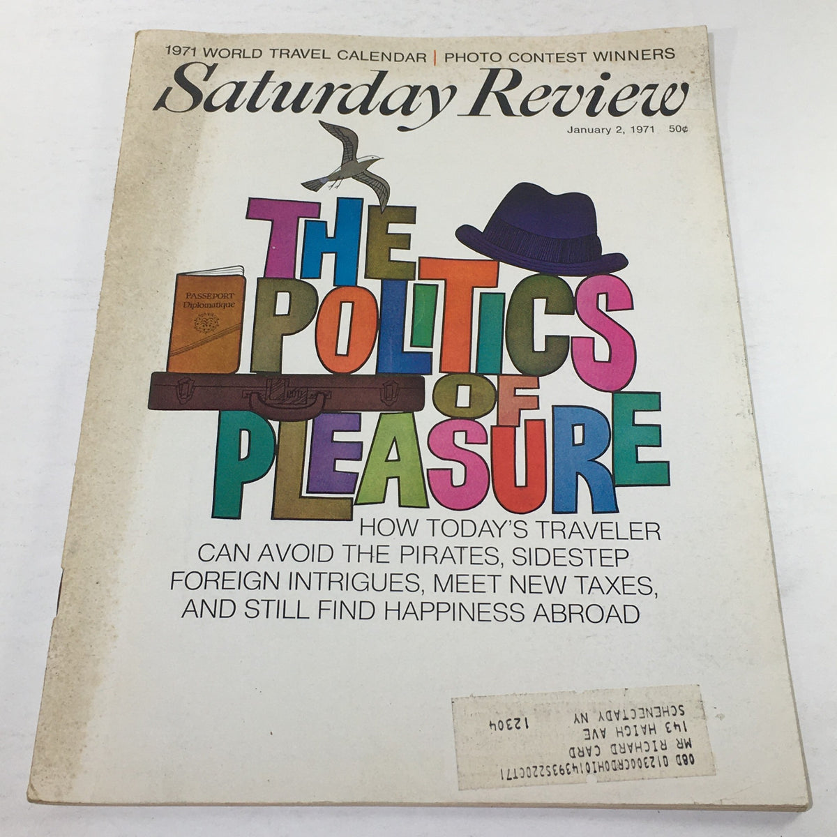 Cover of VTG Saturday Review: January 2 1971 - World Travel Issue, featuring colorful text 'The Politics of Pleasure' and an illustration of a suitcase and hat.