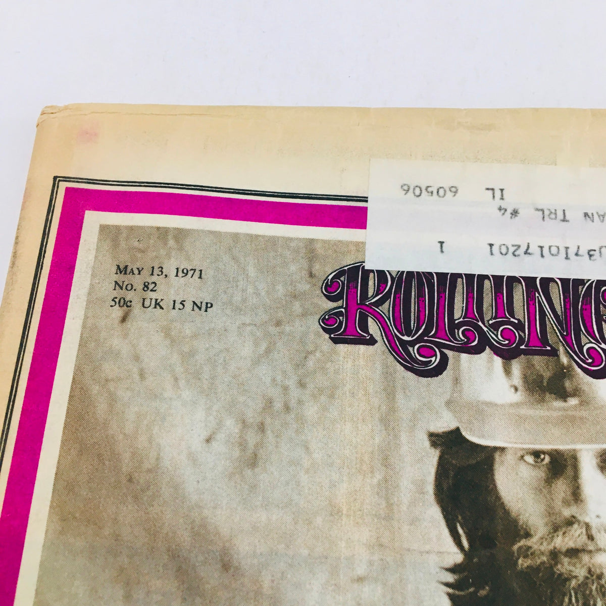 Close-up of the cover of Rolling Stone Magazine, May 13, 1971, issue #82, featuring vintage design elements and details including the issue date and price.