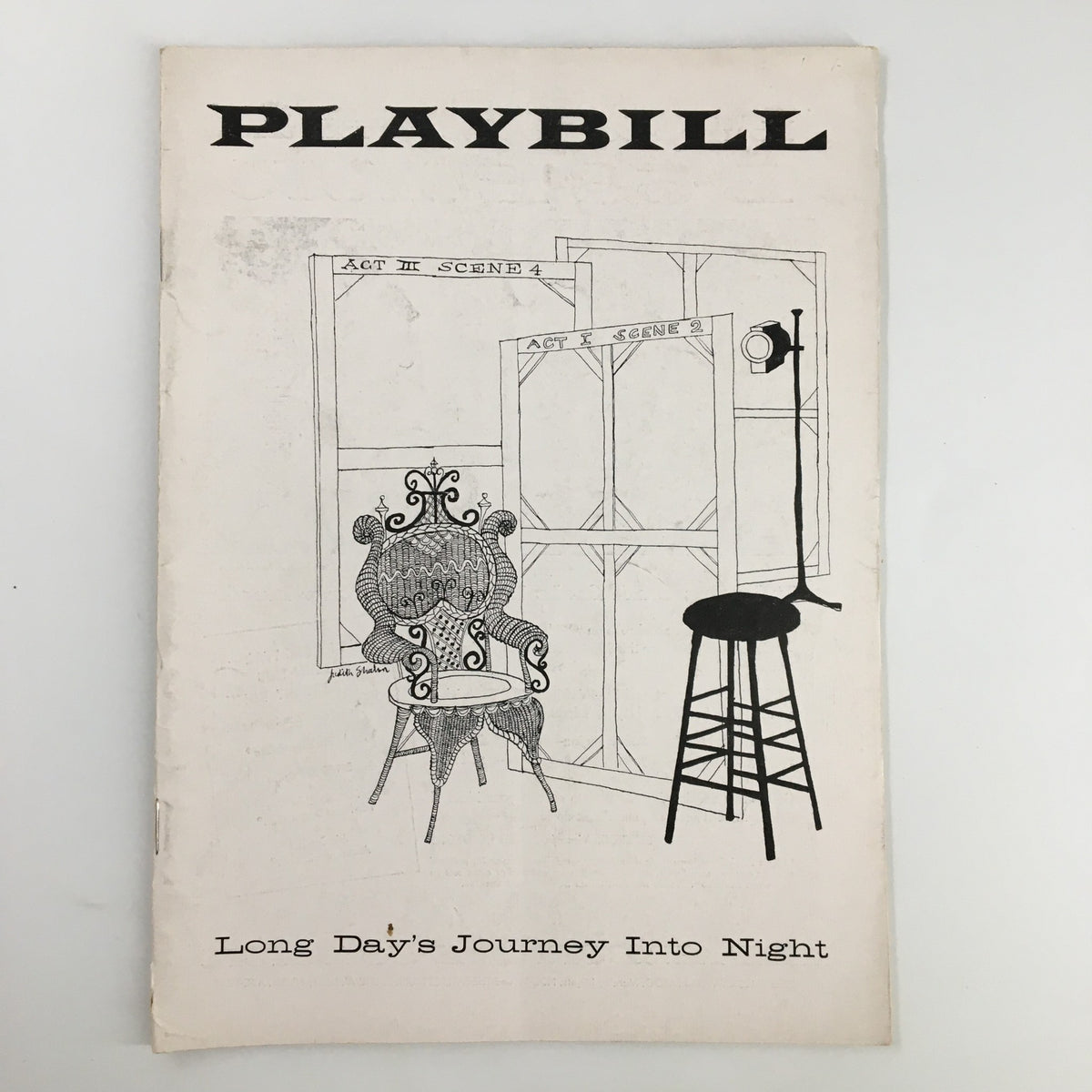 1957 Playbill for Eugene O'Neill's Long Day's Journey Into Night at Helen Hayes Theatre featuring a stylized design with a theater scene illustration.