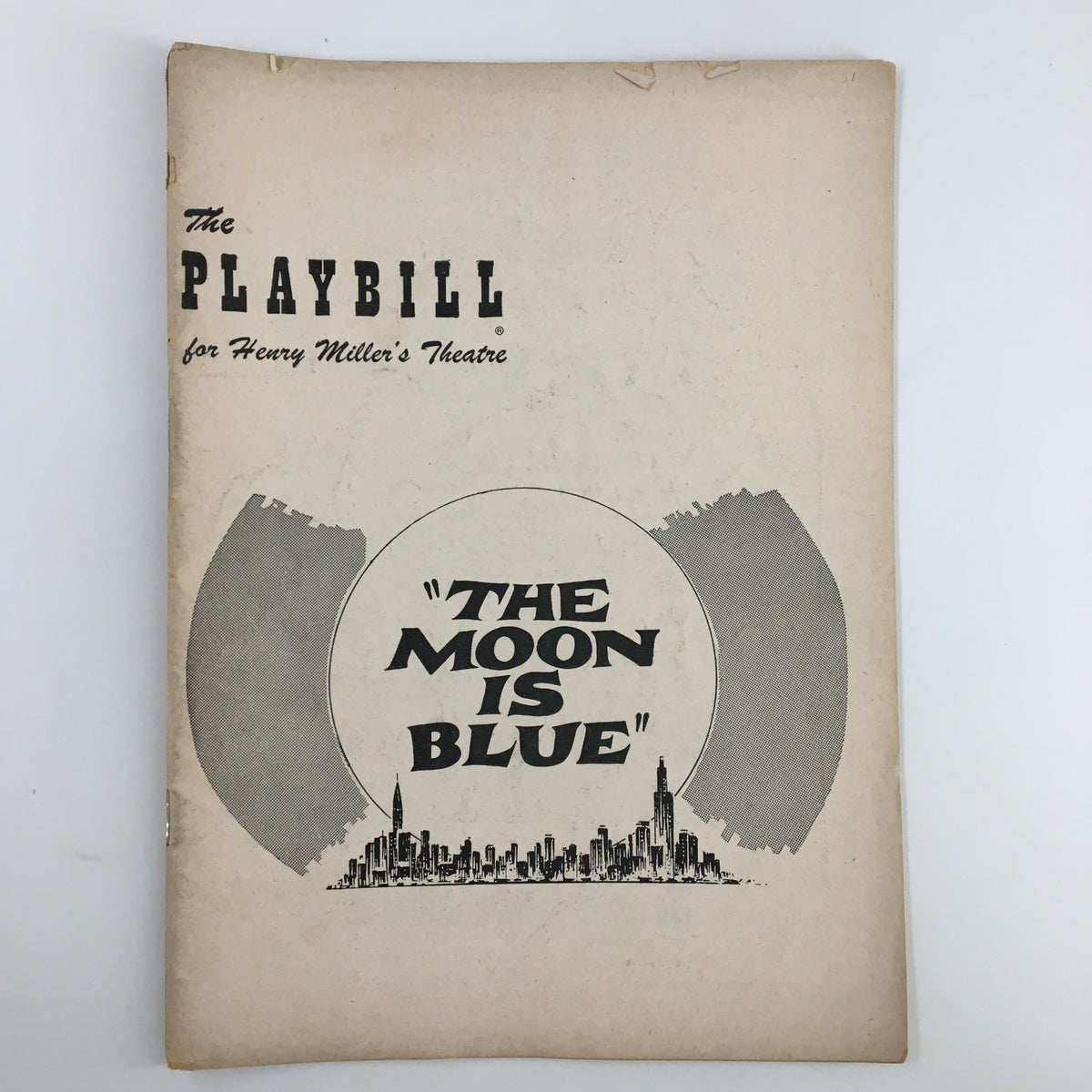 1951 Playbill for Henry Miller's Theatre featuring 'The Moon is Blue', showcasing the iconic cover design with city skyline illustration.