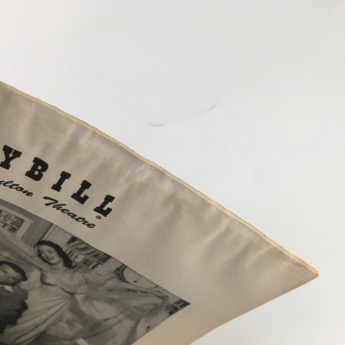 Close-up of the top of the 1953 Playbill for 'The Seven Year Itch' showing the vintage cover's edge and slight wear indicating its age.