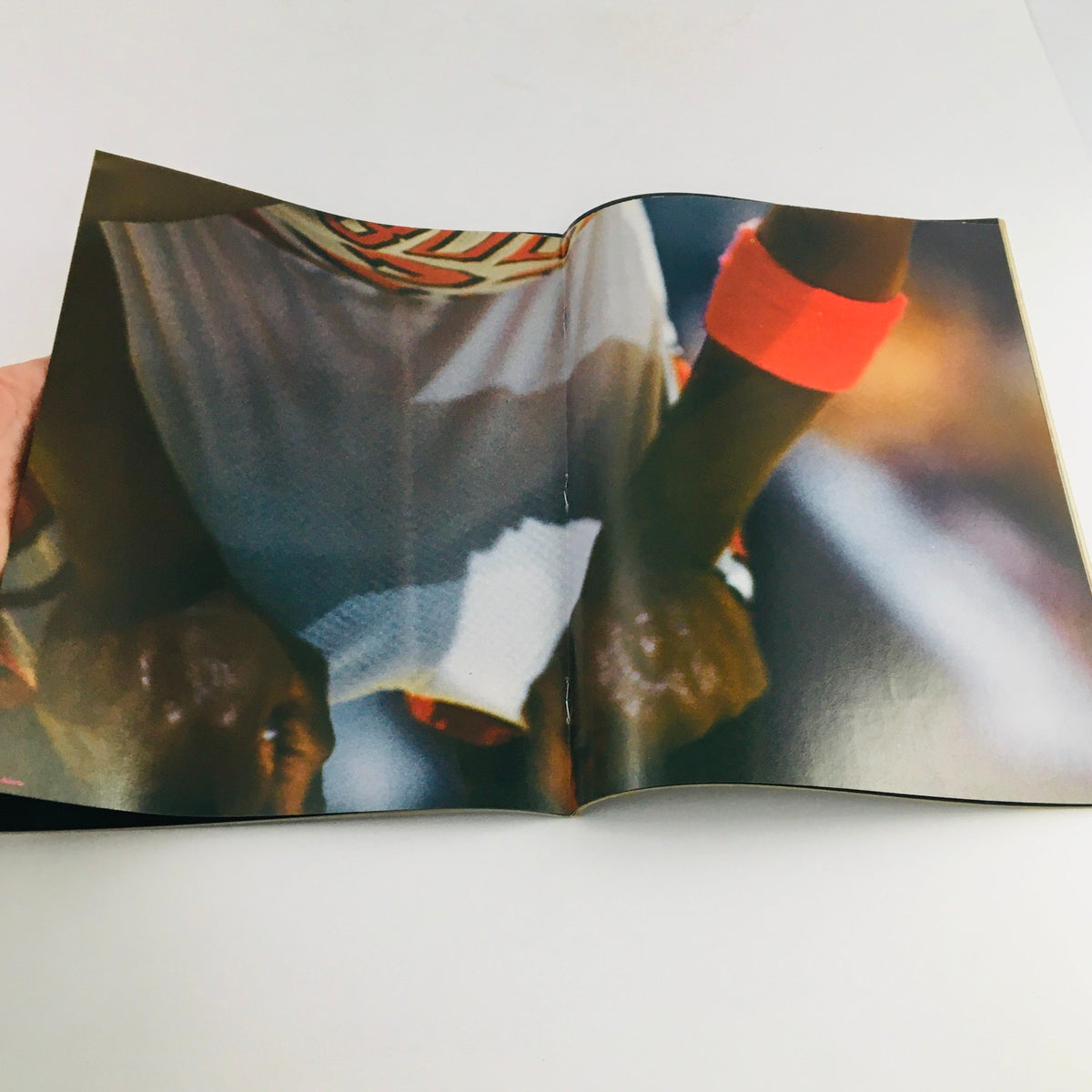 Inside spread of the 1993 Trading Cards: A Tribute to Michael Jordan magazine, displaying close-up imagery of Michael Jordan's hands during a game, showcasing the iconic detail of his basketball play.