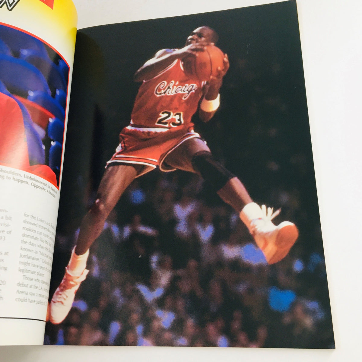 1993 A Tribute To Michael Jordan No. 1 Commemorative Edition, No Label VG - An image of a player in mid-air action while dribbling a basketball, highlighting the athletic prowess of Michael Jordan during a game.
