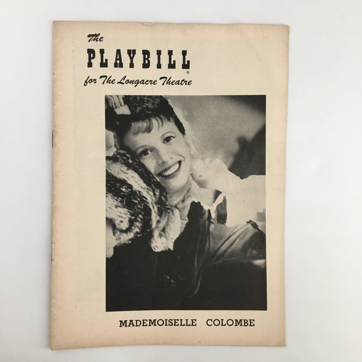 1954 Playbill Longacre Theatre featuring Julie Harris and Edna Best in Mademoiselle Colombe, showcasing the iconic front cover photograph.