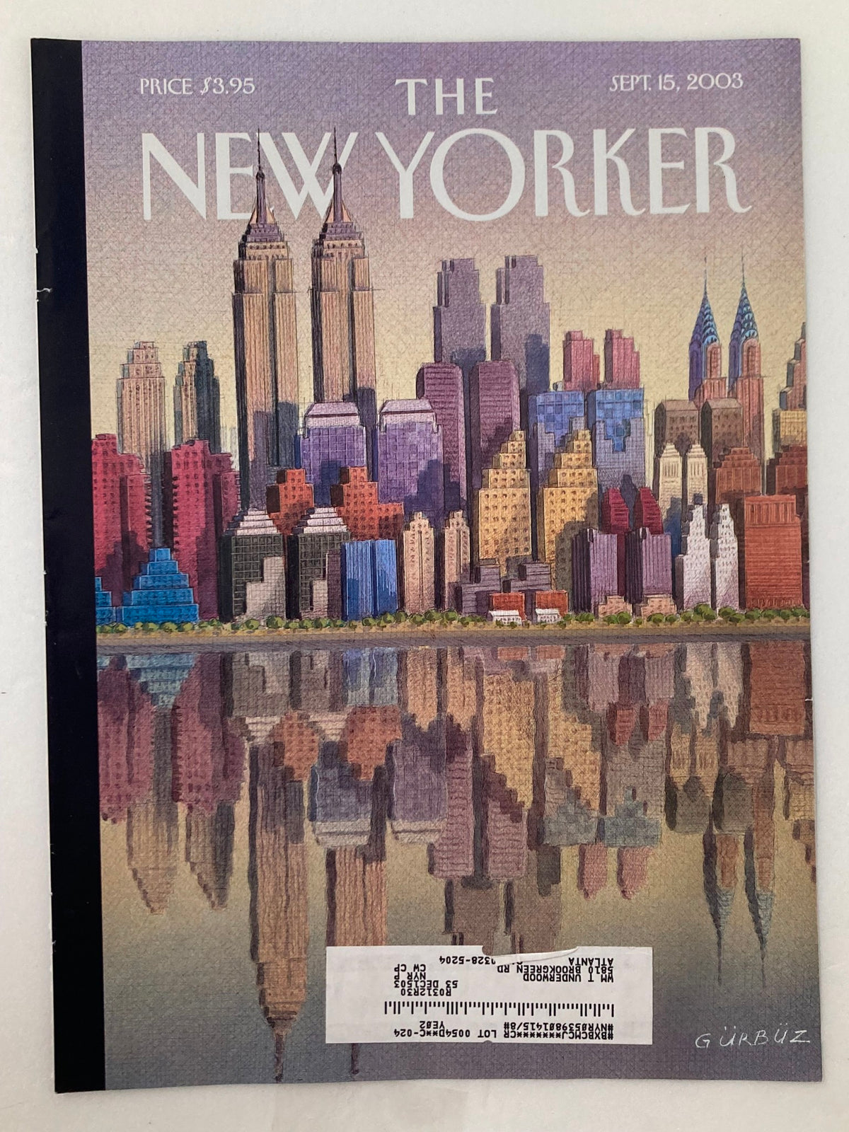 Cover of The New Yorker issued on September 15, 2003, depicting a vibrant skyline art by Gurbuz, highlighting skyscrapers and their mirror image in a reflective surface.