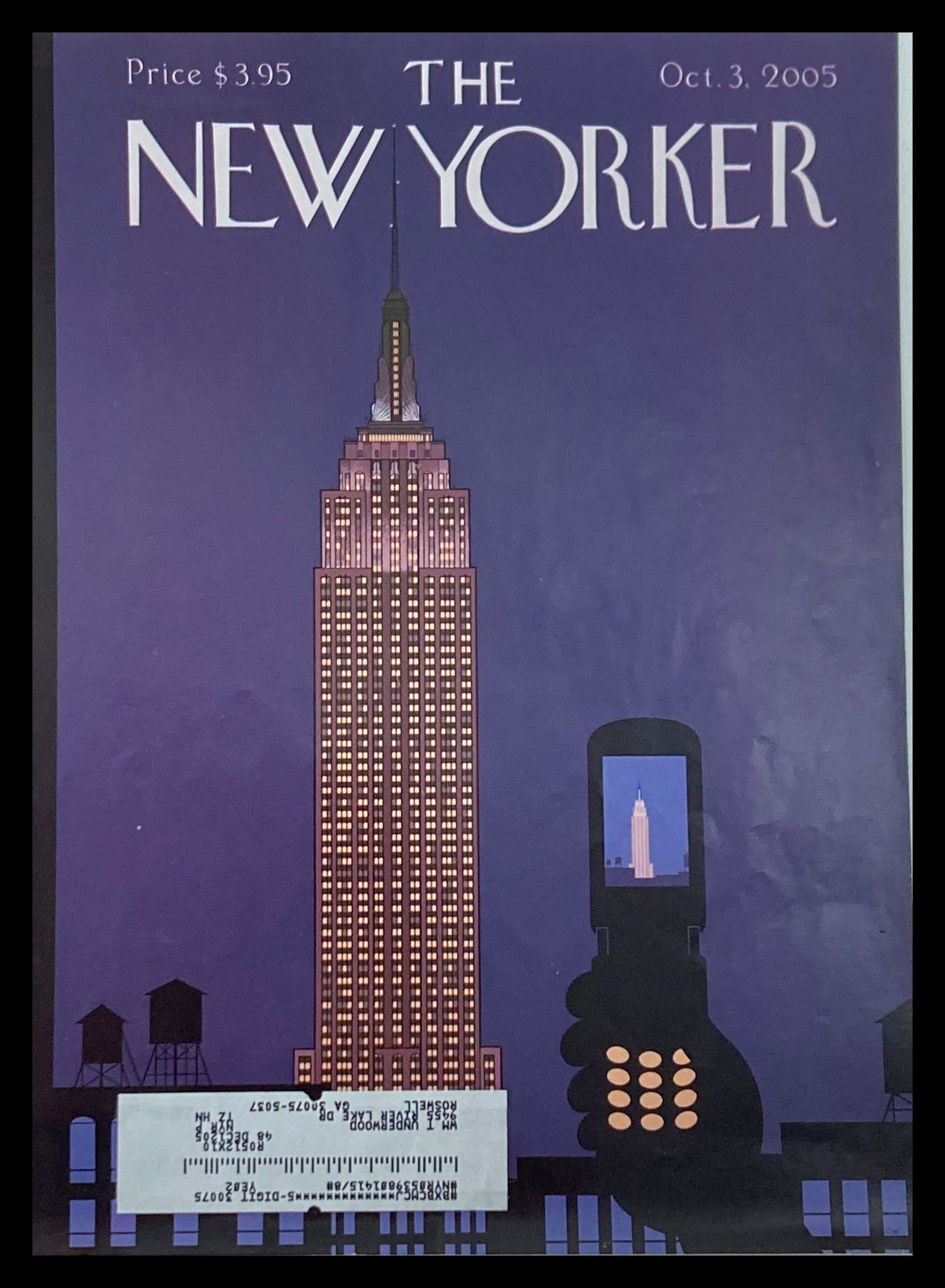 Cover only The New Yorker October 3 2005 featuring the Empire State Building against a purple sky, with a person holding a smartphone displaying the building's image.