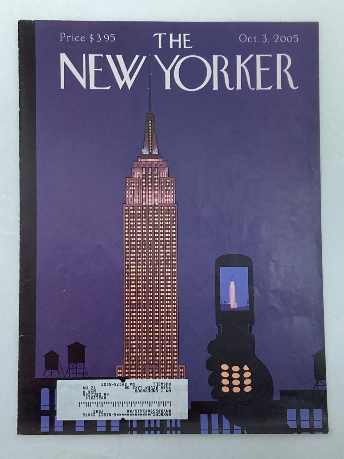 Cover only The New Yorker October 3 2005 showcasing the iconic Empire State Building illuminated at night, with a smartphone in the foreground reflecting the tower.
