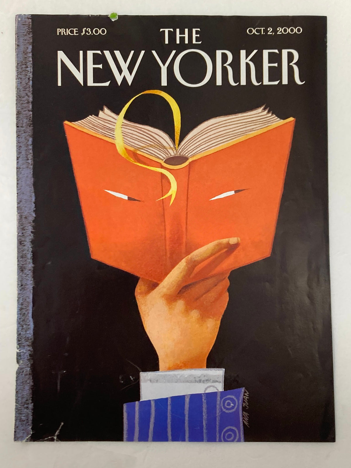 Close-up view of the cover of The New Yorker magazine, October 2, 2000, 'Page-Turner' by Ana Juan, showcasing vibrant colors and a hand holding a book.