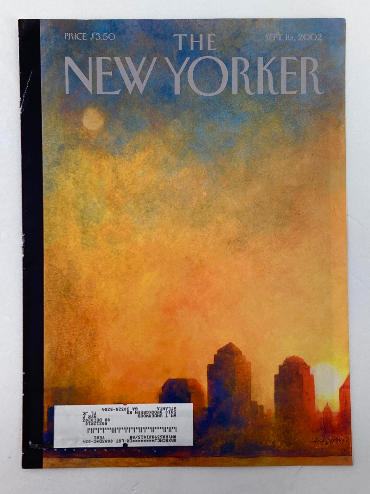 Close-up view of The New Yorker cover from September 16, 2002, showcasing the beautiful illustration 'Dawn Over Manhattan' by Ana Juan, with visible wear and a label.