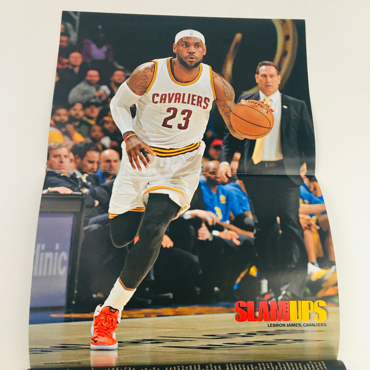 Slam Magazine September 2018 #181 featuring a poster of LeBron James in a Cavaliers uniform, showcasing his dynamic play style on the court.