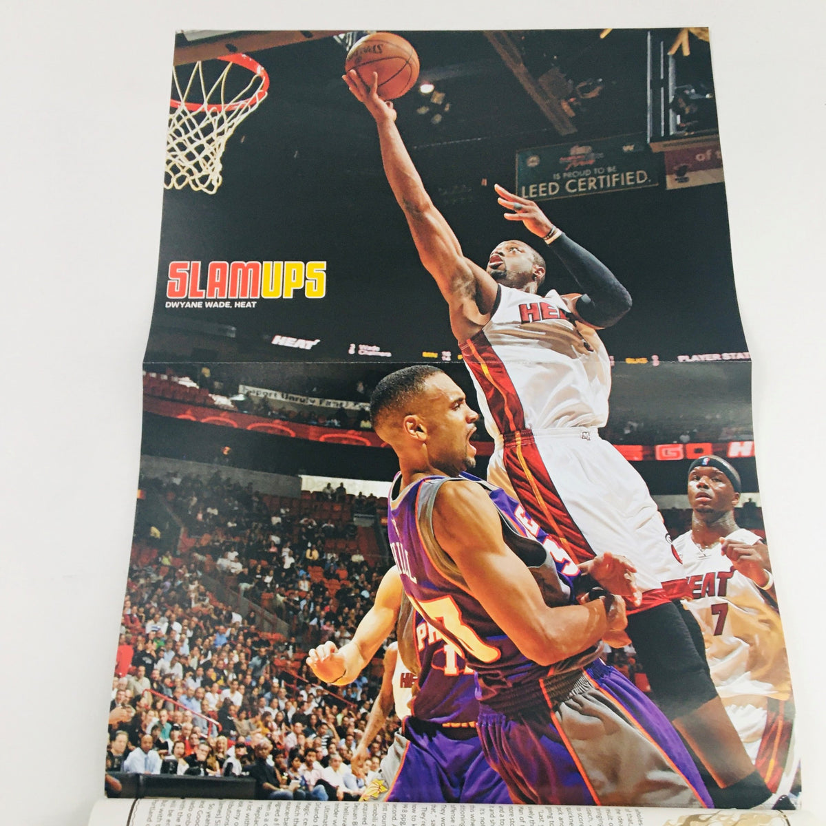 Slam Magazine February 2010 issue #134 featuring Dwight Howard soaring for a dunk, showcasing his athleticism and dynamic play during the game. A vintage collectible with prominent basketball culture significance.