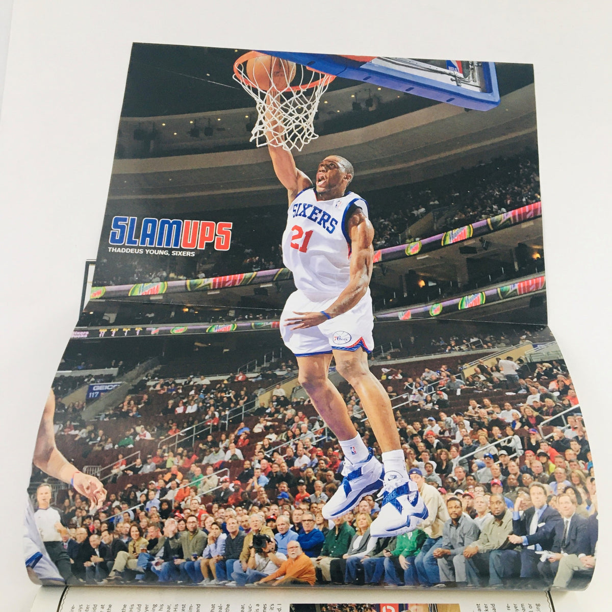 Slam Magazine February 2010 issue #134 featuring Thaddeus Young from the Philadelphia 76ers performing an impressive dunk, emphasizing his skills and contributions to the game. A valuable piece for basketball fans and collectors.