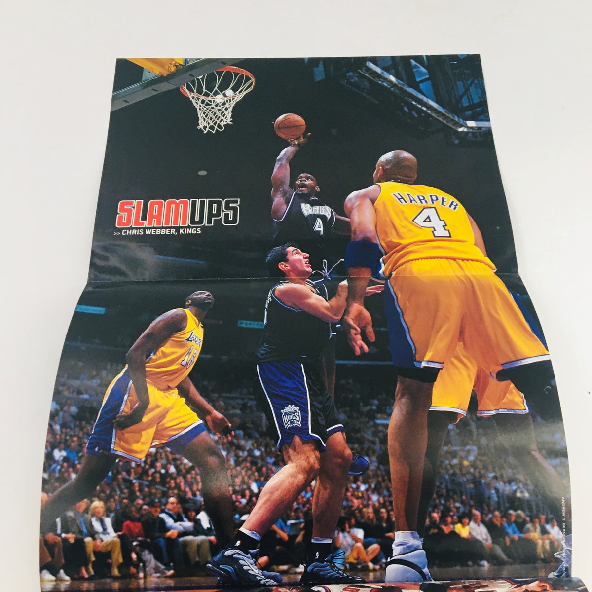 Folded poster from Slam Magazine November 2000 Issue #46 displaying Chris Webber in action during an NBA game against the Lakers.