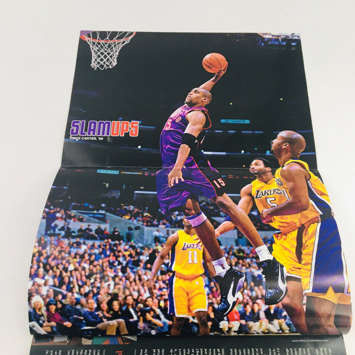 Slam Magazine 2009 Vol 16 #10 - Poster featuring Magic Carter performing a dunk, capturing a moment in basketball history.