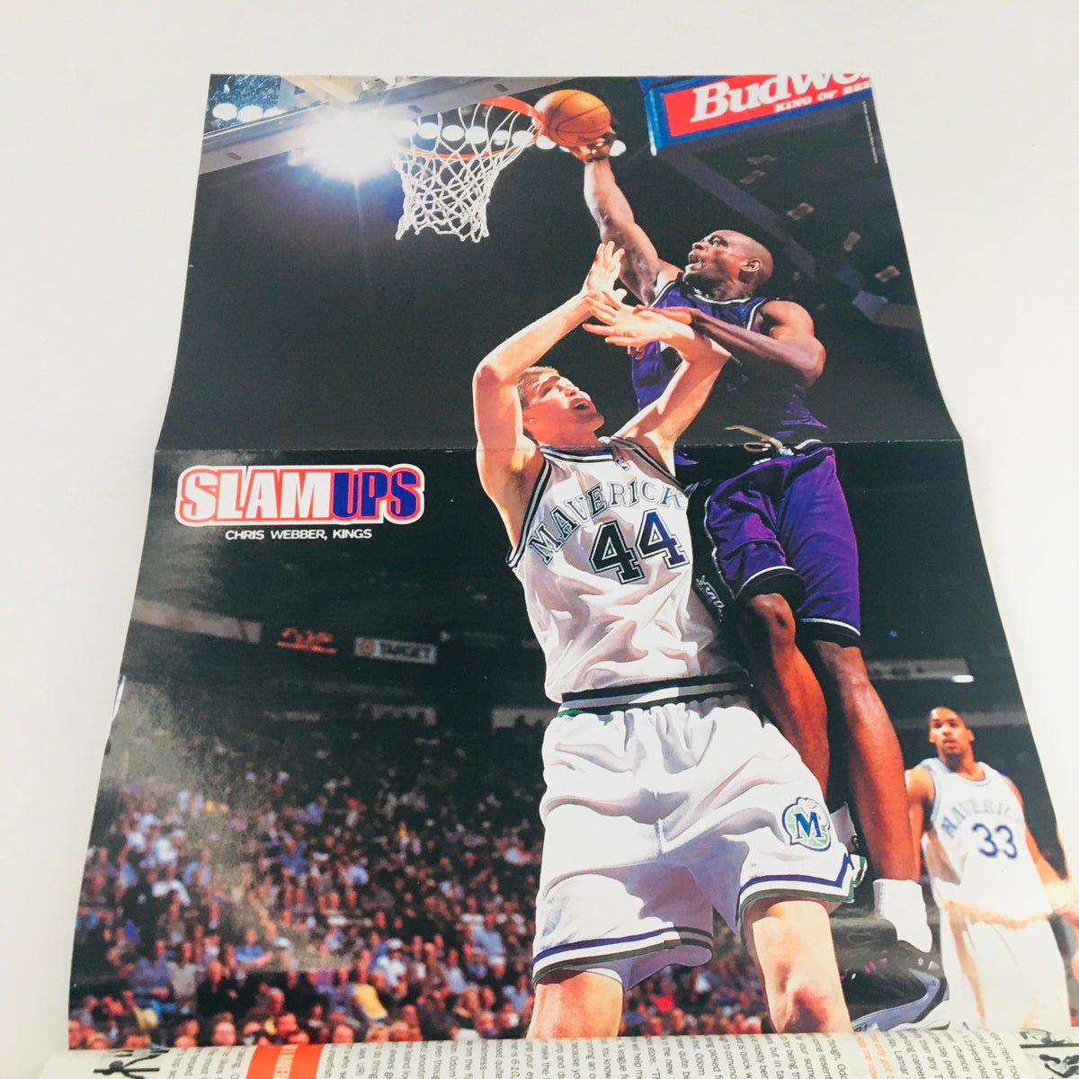 Slam Magazine 1999 Vol 6 #7 featuring a thrilling action shot of Chris Webber dunking during an NBA game, highlighting the excitement of basketball collectibles.