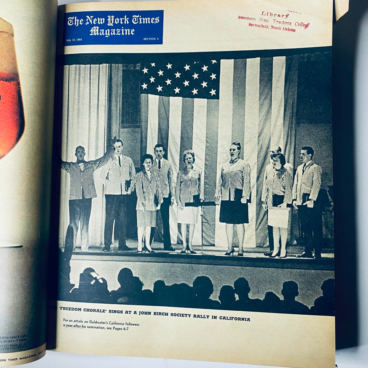 Performance scene from The New York Times Magazine July 14, 1965, showing the Freedom Chorale singing at a John Birch Society rally in California, against a backdrop of the American flag.
