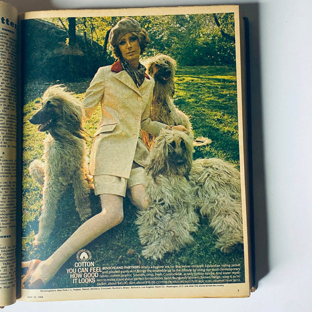 Cover of The New York Times Magazine from July 21, 1968, showcasing a fashion advertisement with a model in a stylish outfit surrounded by three poodles, symbolizing contemporary style.