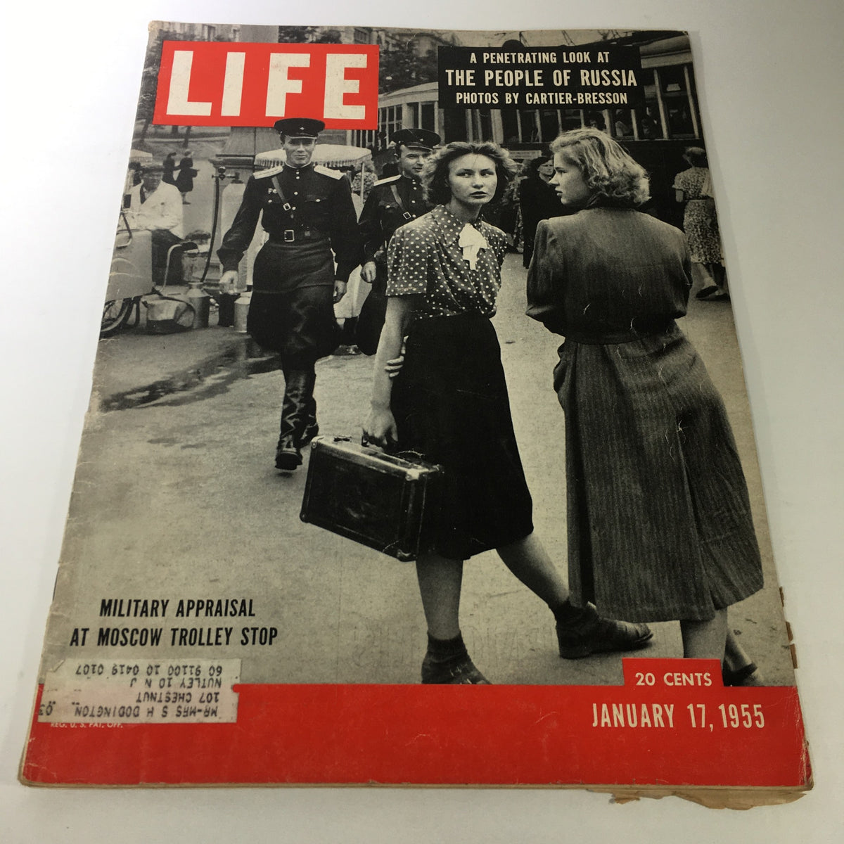Cover of VTG Life Magazine January 17 1955 featuring a penetrating look at The People of Russia with a military appraisal theme. The cover displays two women with a suitcase in front of soldiers.