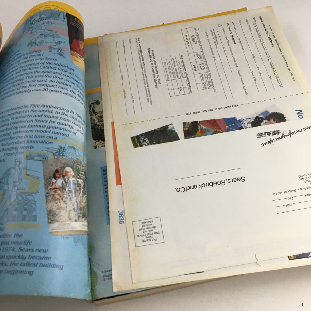 Inside view of the VTG 1986 Centennial Edition Fashion Apparel & Home Furnishing Catalog, showcasing pages with colorful illustrations and vintage designs.