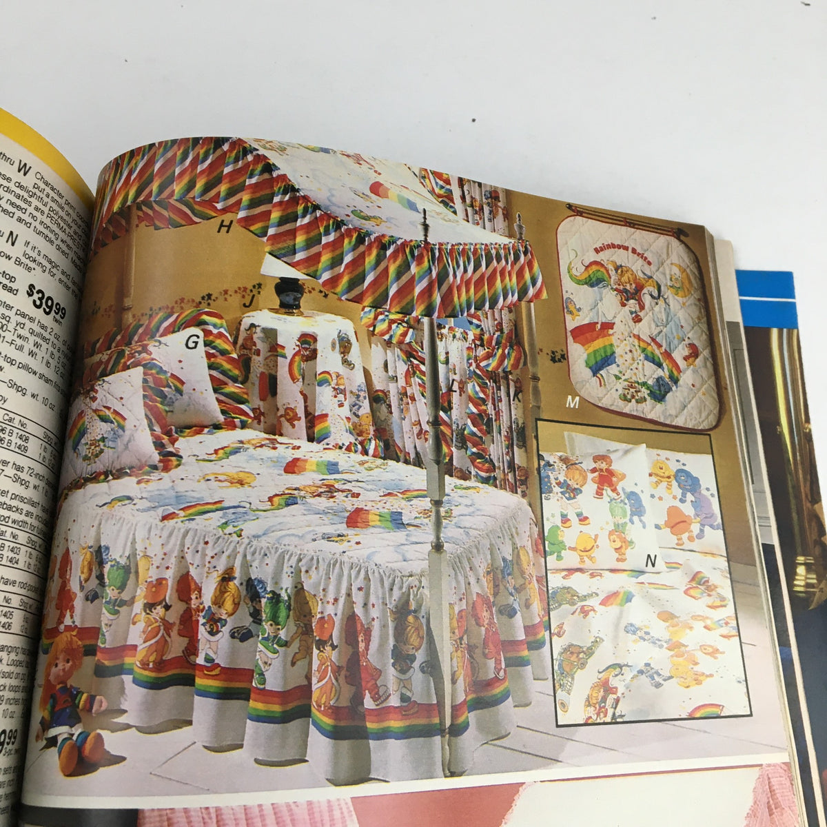 VTG 1986 Centennial Edition Fashion Apparel & Home Furnishing Catalog displaying a colorful children’s bedroom set with playful designs and cheerful patterns.