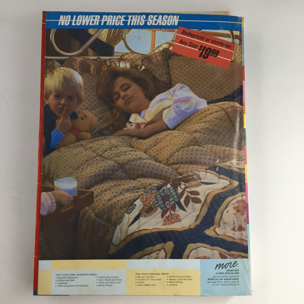 VTG 1986 Centennial Edition Fashion Apparel & Home Furnishing Catalog featuring a cozy scene of a mother and child in bed with a patterned comforter, highlighting promotional pricing.
