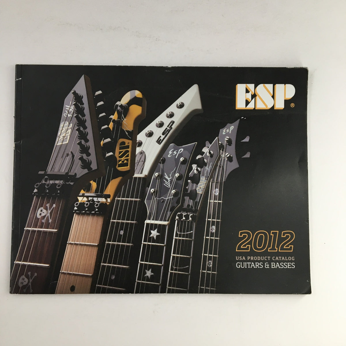 ESP Guitars 2012 USA Product Catalog featuring various guitars and basses displayed on the cover.